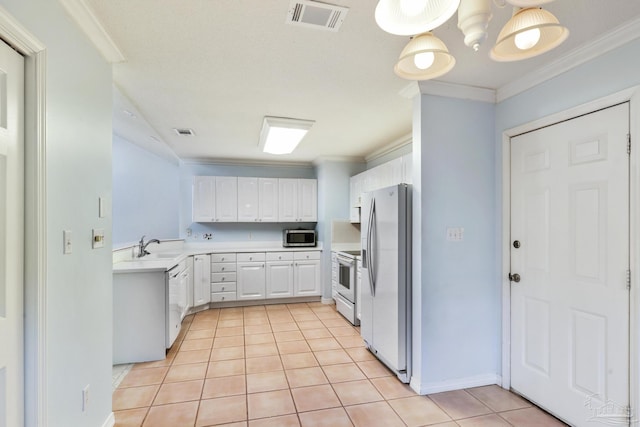 kitchen with sink, stainless steel appliances, light tile patterned floors, crown molding, and white cabinets