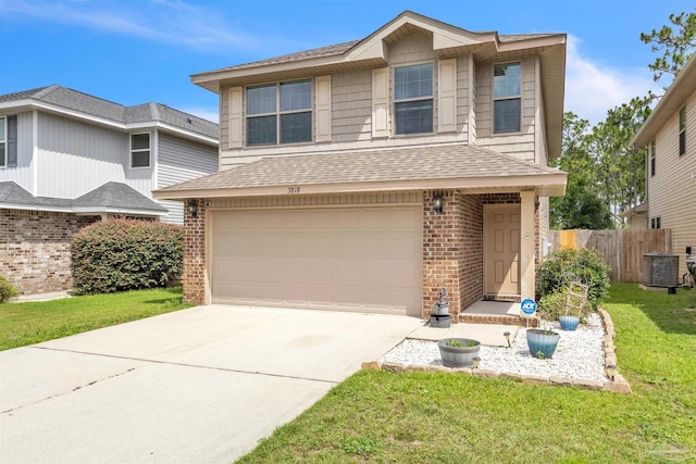 3818 Weatherstone Cir, Pensacola, FL 32507 - view of front facade with brick siding, a garage, driveway, and a shingled roof