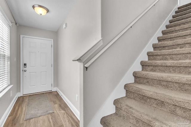 3818 Weatherstone Cir, Pensacola, FL 32507 - foyer entrance featuring stairs and wood finished floors