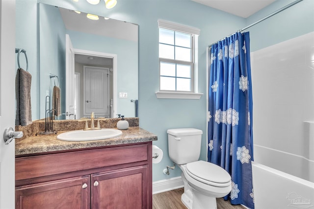 3818 Weatherstone Cir, Pensacola, FL 32507 - bathroom featuring vanity, shower / bath combo, and wood finished floors