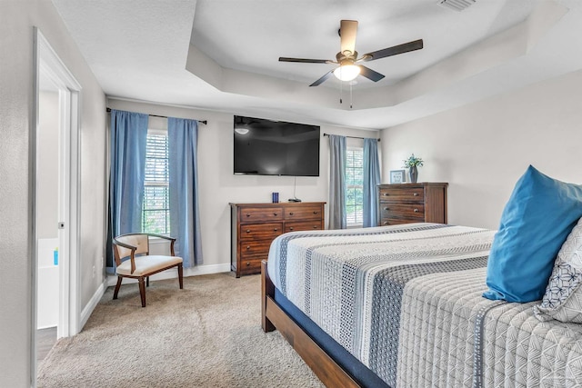 3818 Weatherstone Cir, Pensacola, FL 32507 - carpeted bedroom featuring a raised ceiling and ceiling fan