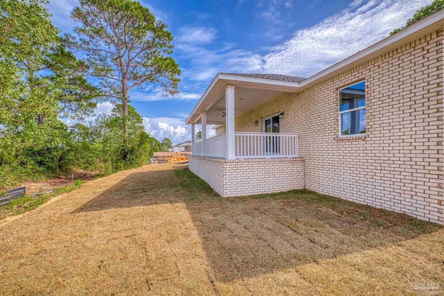 view of home's exterior featuring a lawn