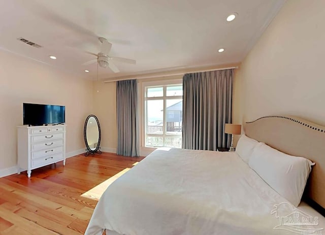 bedroom featuring ceiling fan and light wood-type flooring