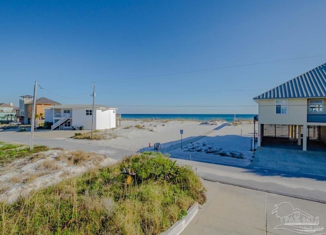 exterior space with a beach view