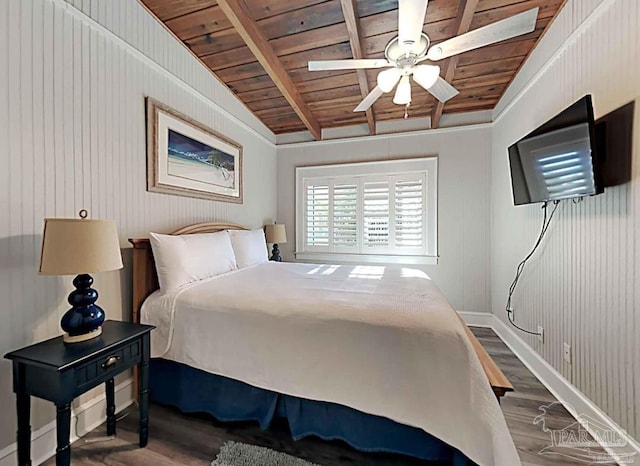 bedroom featuring lofted ceiling, wooden ceiling, baseboards, and wood finished floors