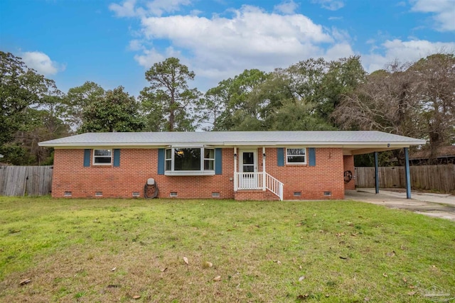 ranch-style home with a front lawn and a carport