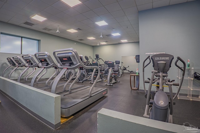 6639 Castlewood St, Navarre, FL 32566 - gym featuring a paneled ceiling