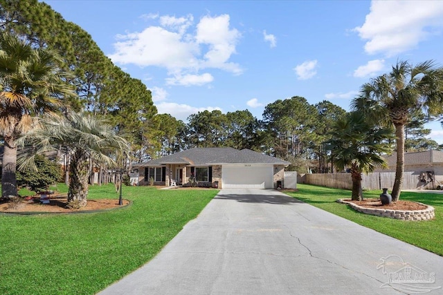 ranch-style house featuring a garage and a front lawn