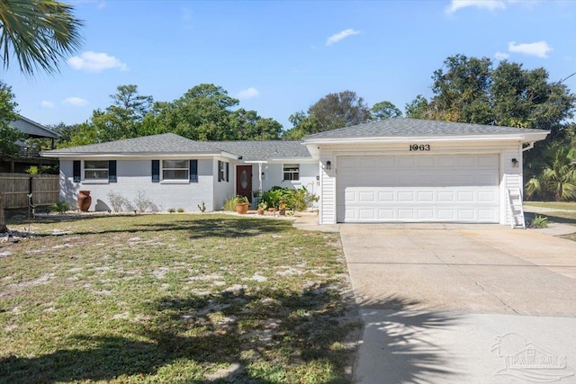 ranch-style house with a front lawn and a garage