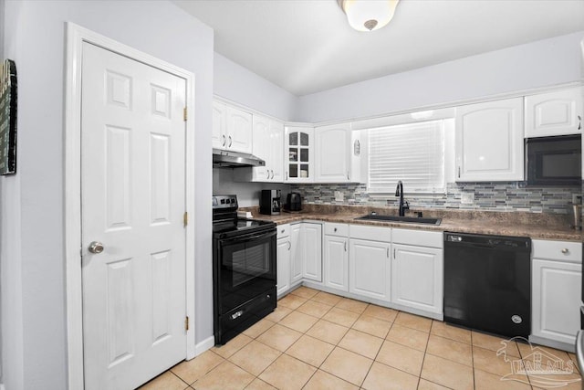 kitchen featuring white cabinets, sink, black appliances, and backsplash