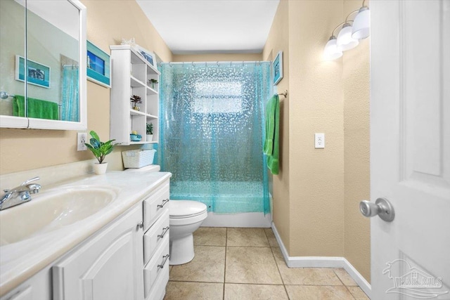 full bathroom featuring vanity, tile patterned flooring, toilet, and bathtub / shower combination