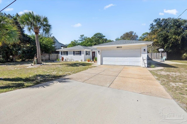 single story home featuring a garage and a front lawn