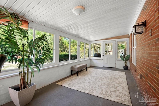 sunroom with vaulted ceiling