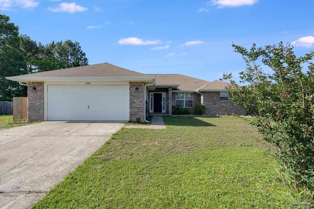 1096 Adrian Way, Milton, FL 32583 - ranch-style house with an attached garage, driveway, and brick siding