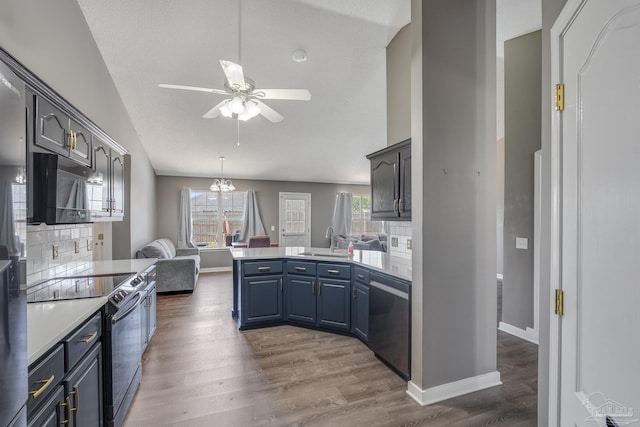 1096 Adrian Way, Milton, FL 32583 - kitchen featuring stainless steel dishwasher, black range with electric stovetop, a sink, a peninsula, and ceiling fan