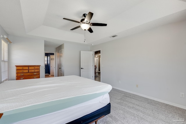 1096 Adrian Way, Milton, FL 32583 - bedroom with a raised ceiling, carpet flooring, baseboards, and a ceiling fan