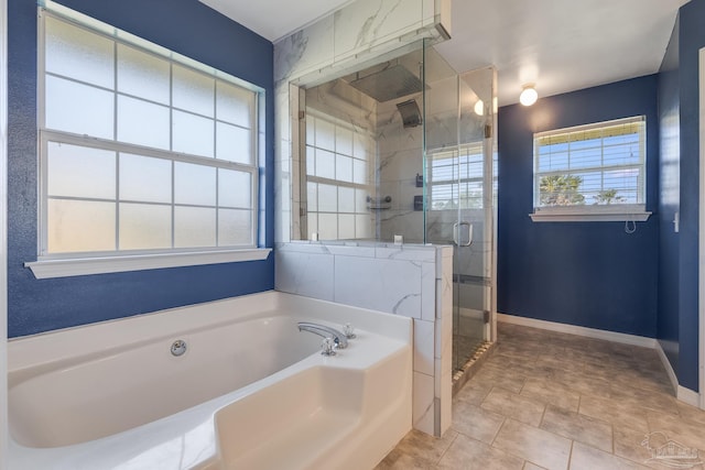 1096 Adrian Way, Milton, FL 32583 - bathroom with a bath, a stall shower, and baseboards