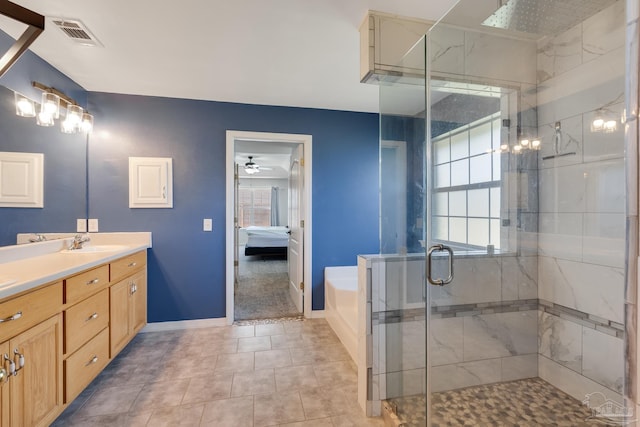 1096 Adrian Way, Milton, FL 32583 - ensuite bathroom with a stall shower, double vanity, a ceiling fan, a bath, and baseboards