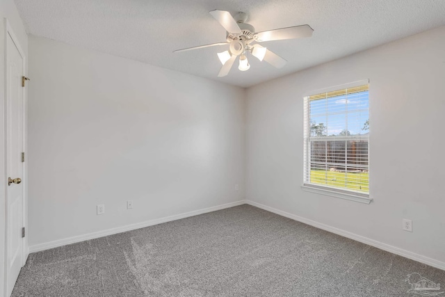1096 Adrian Way, Milton, FL 32583 - empty room with carpet, ceiling fan, a textured ceiling, and baseboards