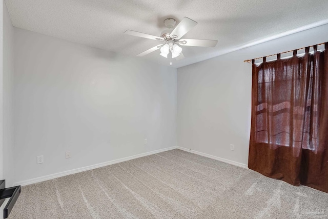 1096 Adrian Way, Milton, FL 32583 - spare room with carpet flooring, a ceiling fan, baseboards, and a textured ceiling