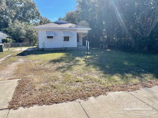 view of front of home with a front yard