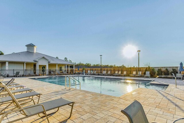 view of pool with a patio area