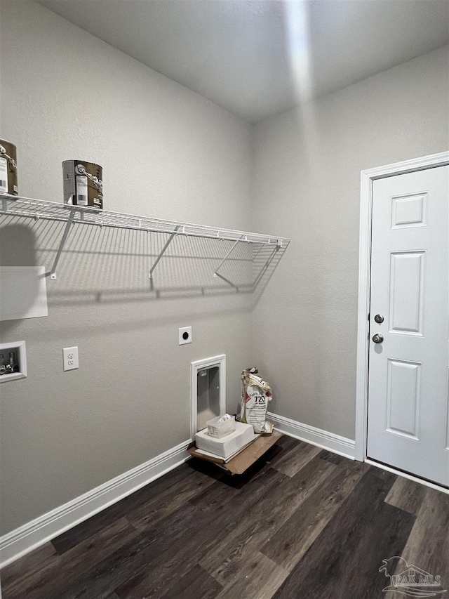 2305 Habersham Ln, Cantonment, FL 32533 - laundry area with electric dryer hookup, wood finished floors, baseboards, and hookup for a washing machine