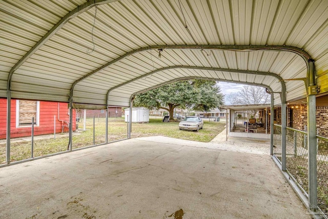 view of parking / parking lot featuring a carport