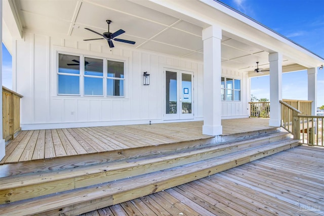 wooden terrace featuring ceiling fan