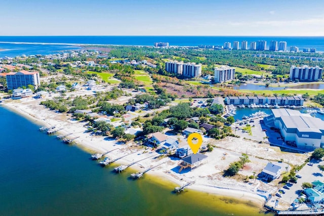 drone / aerial view with a view of the beach and a water view