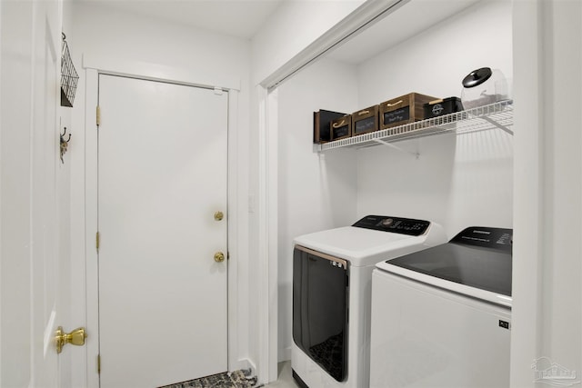 clothes washing area featuring laundry area and independent washer and dryer