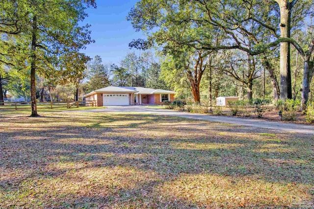 view of front of house featuring driveway and an attached garage