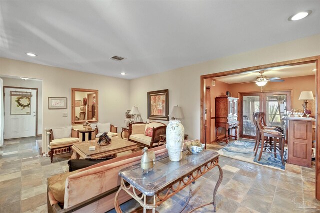 living room featuring ceiling fan