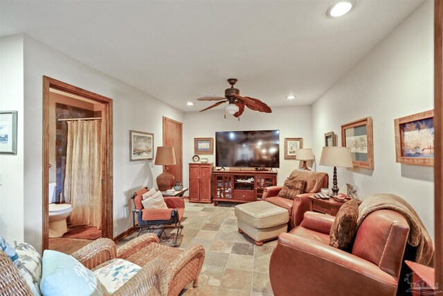 living room with ceiling fan