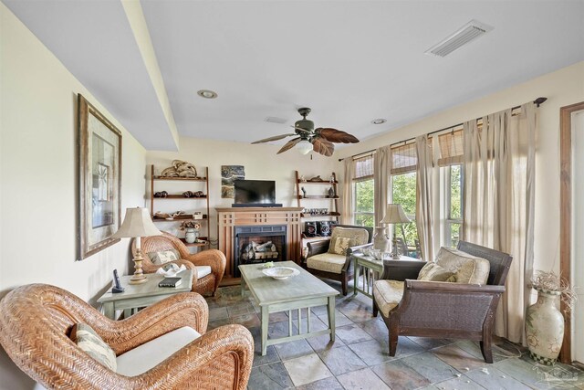 living room with ceiling fan