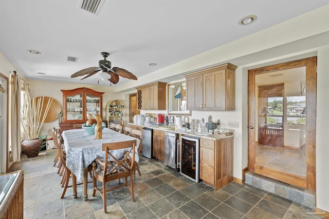 kitchen featuring ceiling fan, beverage cooler, and dishwasher