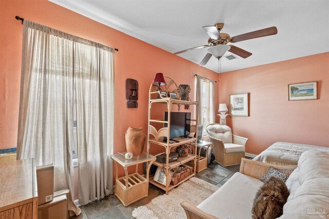 living room with ceiling fan