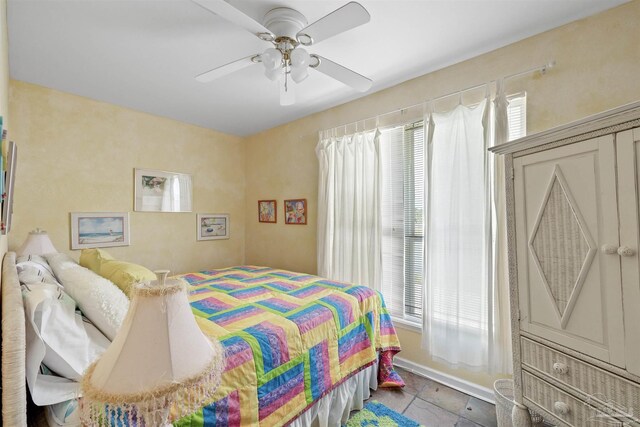 bedroom featuring ceiling fan