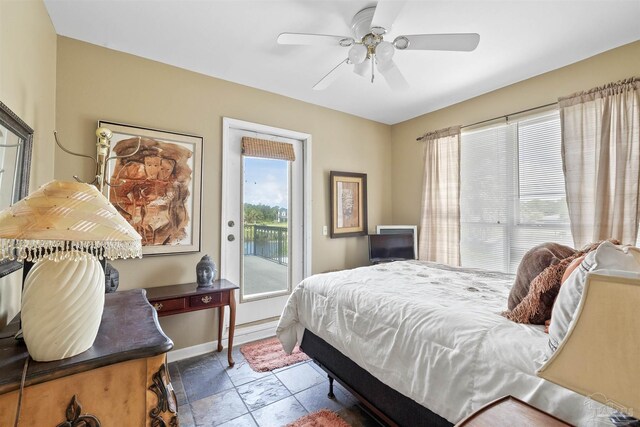 bedroom featuring access to exterior and ceiling fan