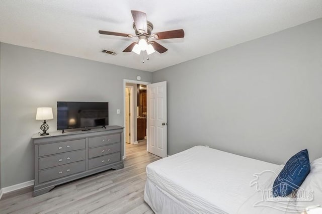 bedroom featuring ceiling fan and light wood-type flooring