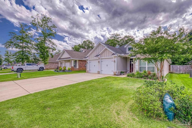 5622 Dunridge Dr, Pace, FL 32571 - craftsman inspired home featuring board and batten siding, an attached garage, concrete driveway, and brick siding