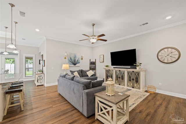 5622 Dunridge Dr, Pace, FL 32571 - living area with ceiling fan, dark wood finished floors, crown molding, and recessed lighting