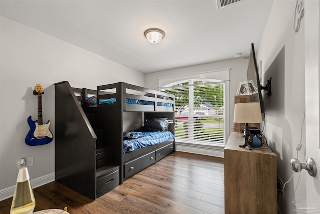 5622 Dunridge Dr, Pace, FL 32571 - bedroom with wood finished floors and baseboards