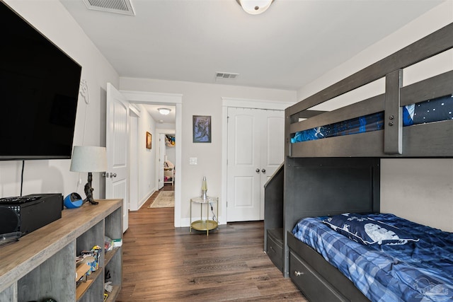 5622 Dunridge Dr, Pace, FL 32571 - bedroom with dark wood finished floors and baseboards