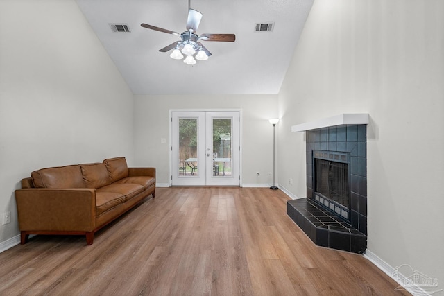 3514 Silvertree Ln, Pensacola, FL 32504 - living area featuring ceiling fan, light wood-type flooring, baseboards, a fireplace, and high vaulted ceiling