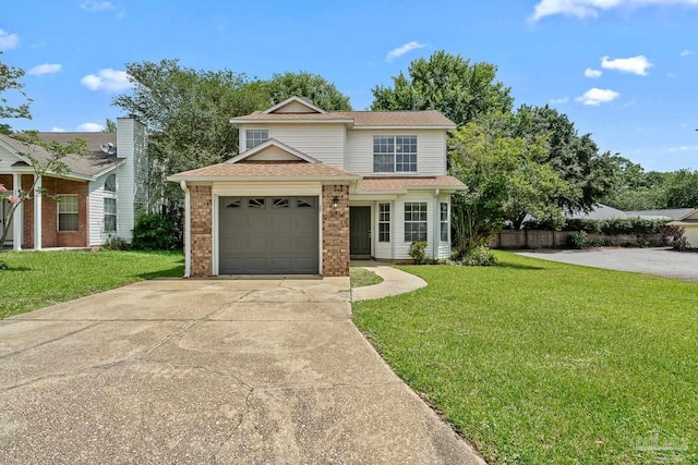 3514 Silvertree Ln, Pensacola, FL 32504 - traditional home with a front yard, concrete driveway, an attached garage, and brick siding