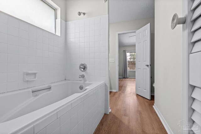 3514 Silvertree Ln, Pensacola, FL 32504 - bathroom with wood finished floors and baseboards