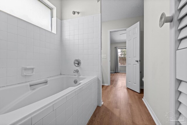 3514 Silvertree Ln, Pensacola, FL 32504 - bathroom with wood finished floors and baseboards