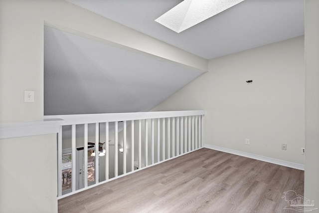 3514 Silvertree Ln, Pensacola, FL 32504 - bonus room featuring a skylight, wood finished floors, lofted ceiling, and baseboards