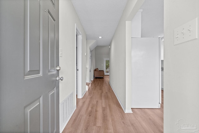 3514 Silvertree Ln, Pensacola, FL 32504 - corridor featuring light wood-type flooring and baseboards
